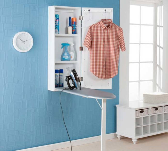 This fold-out ironing board/cabinet is perfect for small laundry rooms
