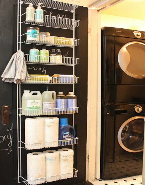 Hang a rack over the door to store all your cleaning and laundry supplies