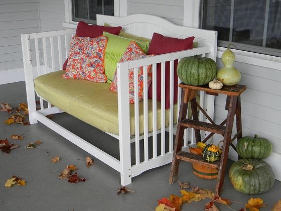 Baby crib turned front porch daybed