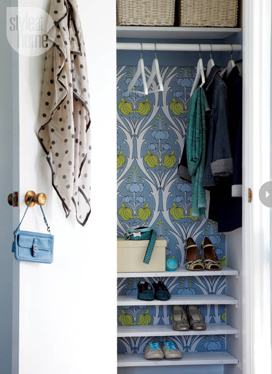 Closet Backed with a Bold Printed Wallpaper