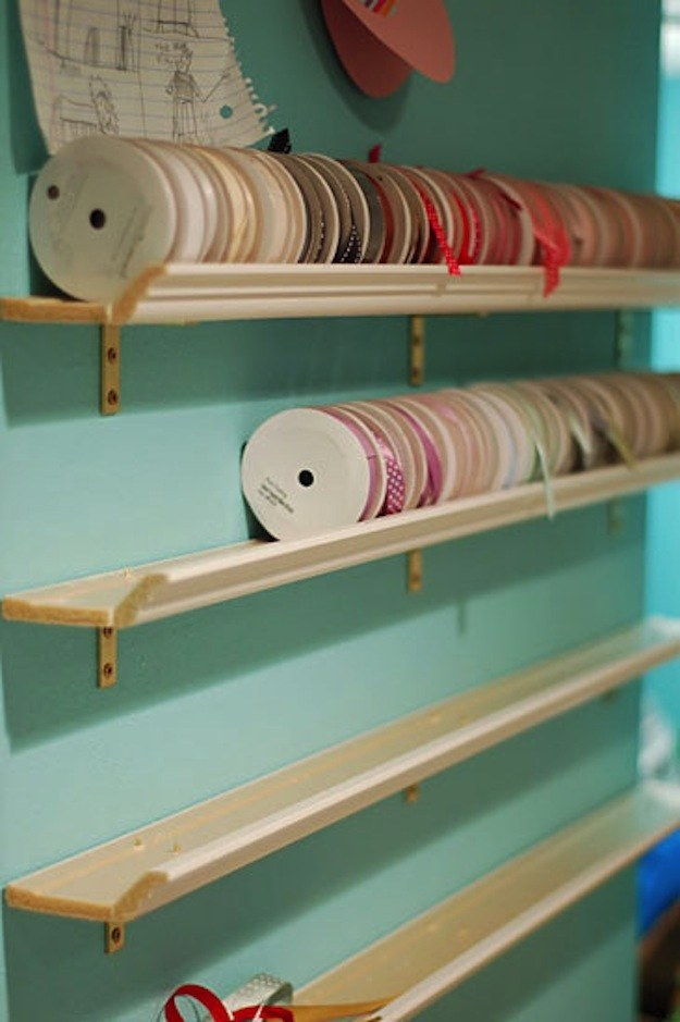 Organize Large Rolls of Ribbon on Crown Molding Shelves