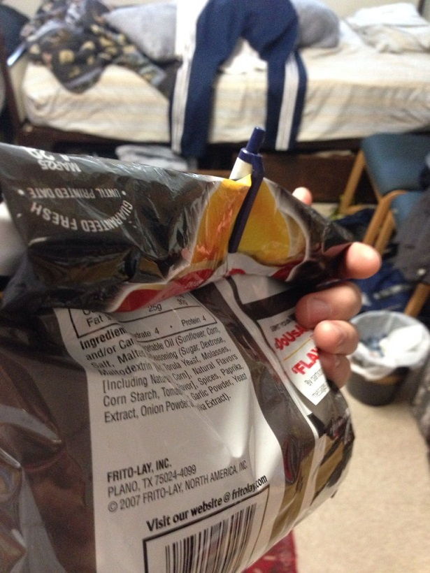 Use a pen as a chip clip to seal a chip bag