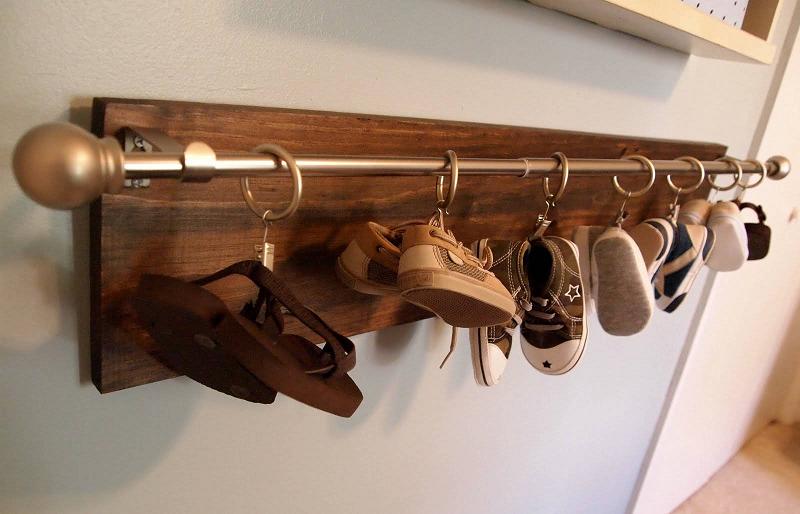 Baby Shoes on a Curtain Rod