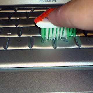 Head of toothbrush becomes keyboard cleaner