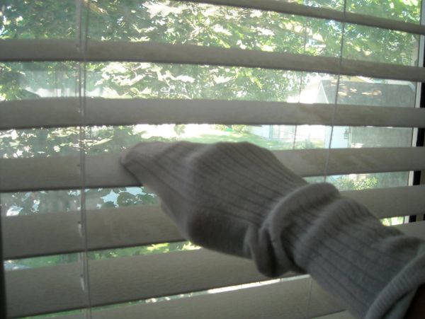 Vinegar, water and an old sock are all the items you need to clean blinds