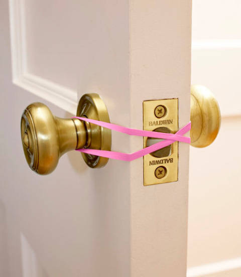 Keep a door unlocked with a rubber band