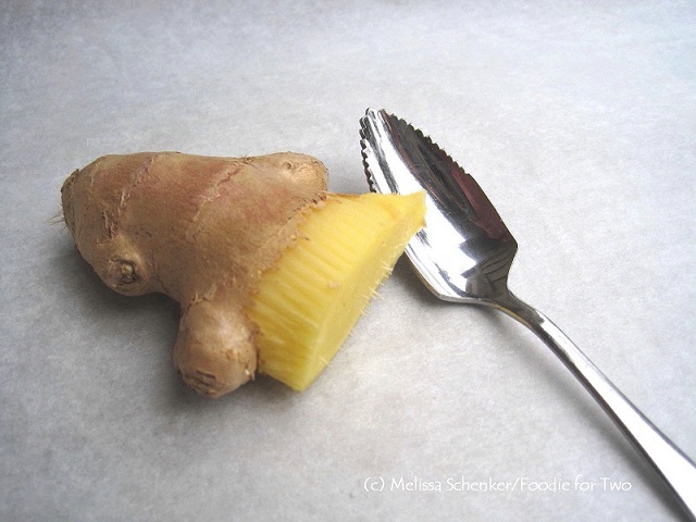 Scrape the skin off of ginger with a grapefruit spoon