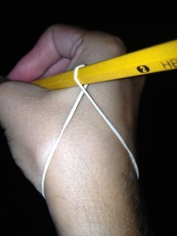 A rubber band will help kids grip pencils better