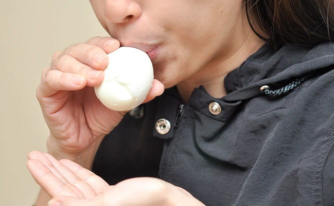 Peel boiled eggs quickly by blowing it out