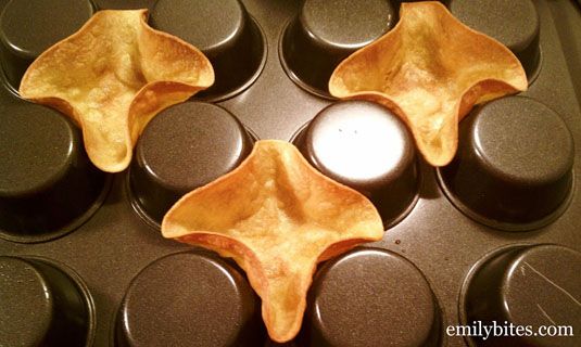 Make mini taco bowls using an upside-down cupcake tin