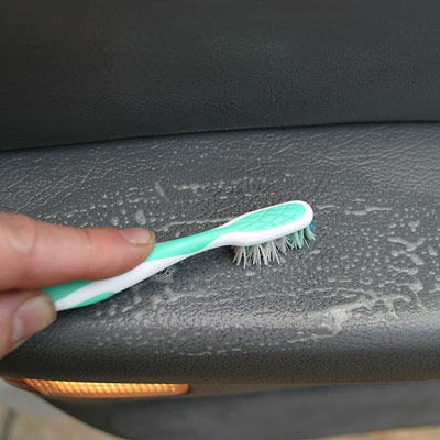 Dirt can hide in between the leather grain. Use a soft bristle toothbrush