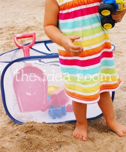 Use a mesh laundry bag to hold toys kids like to play with at the beach