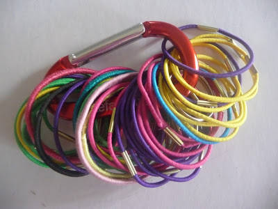 Stash hair ties with a carabiner