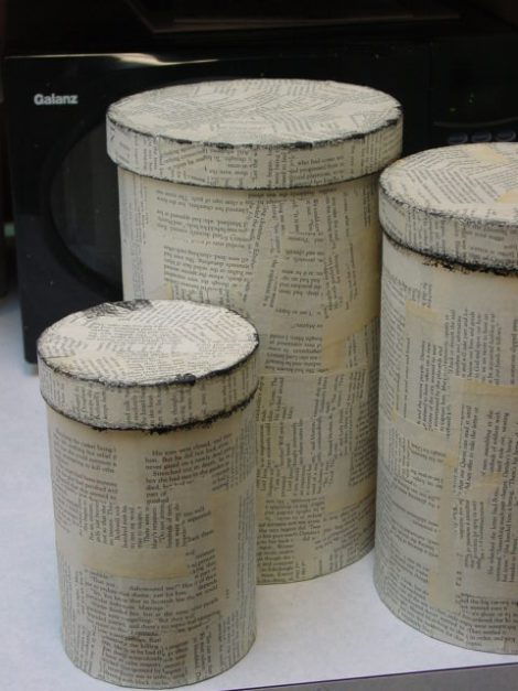 Boxes covered with old book pages