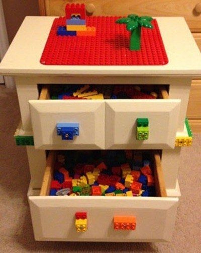 Bedside table modifies into a Lego desk