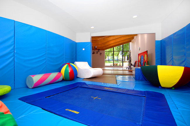 Playroom with trampoline flooring