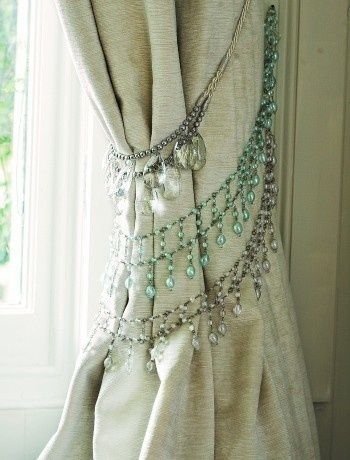 Use your old rhinestone necklaces to make curtain tiebacks for a bohemian-inspired home.