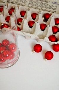 Egg cartons provide organization and protection from breakage for small holiday decorations