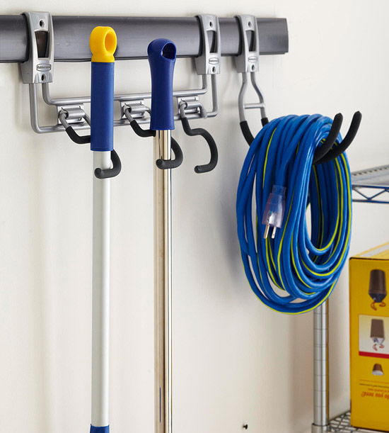 Wall-mounted rails are a space-savvy way to store larger items