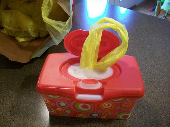 Turn empty baby wipes container to a pop-up bag dispenser
