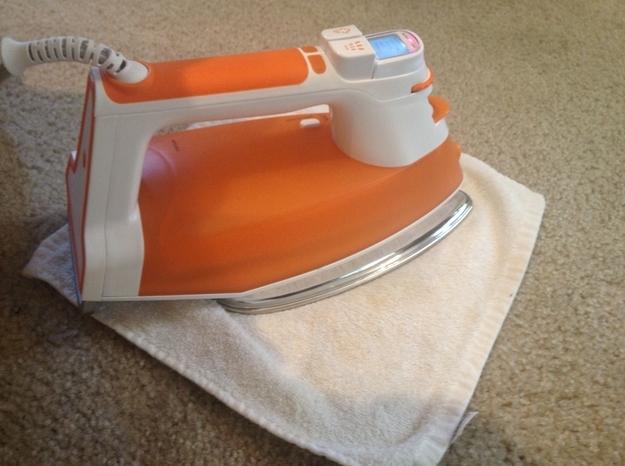Remove Carpet Stains with an Iron and Vinegar