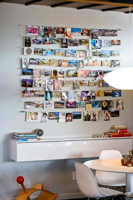 Create a display for your favorite photos with binder clips and wire