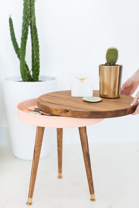 Hide your magazines and remote control in this adorable side table
