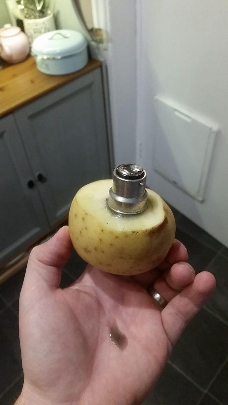 Remove a broken light bulb with a potato