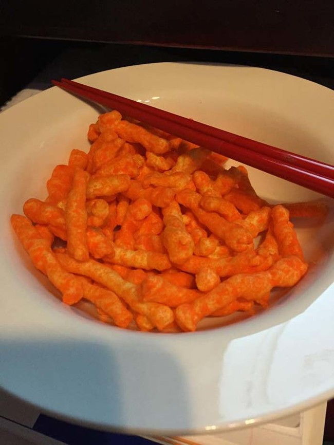 Eat cheesy snacks by your computer with chopsticks to keep your fingers clean