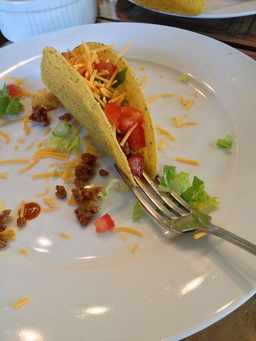 Keep tacos standing upright with a fork