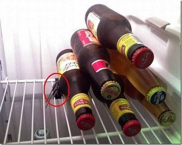 Use a File Clip to Keep Bottles, Jars from Rolling in the Fridge