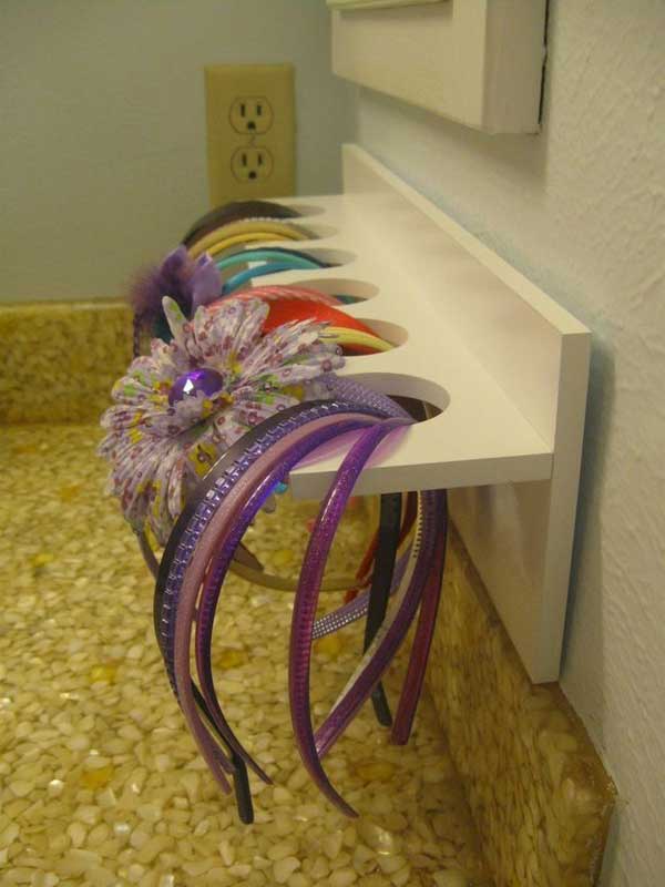Use a wooden craft store rack to hold headbands
