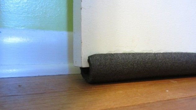 Use Pipe Insulation to Fill Gaps Below Doors